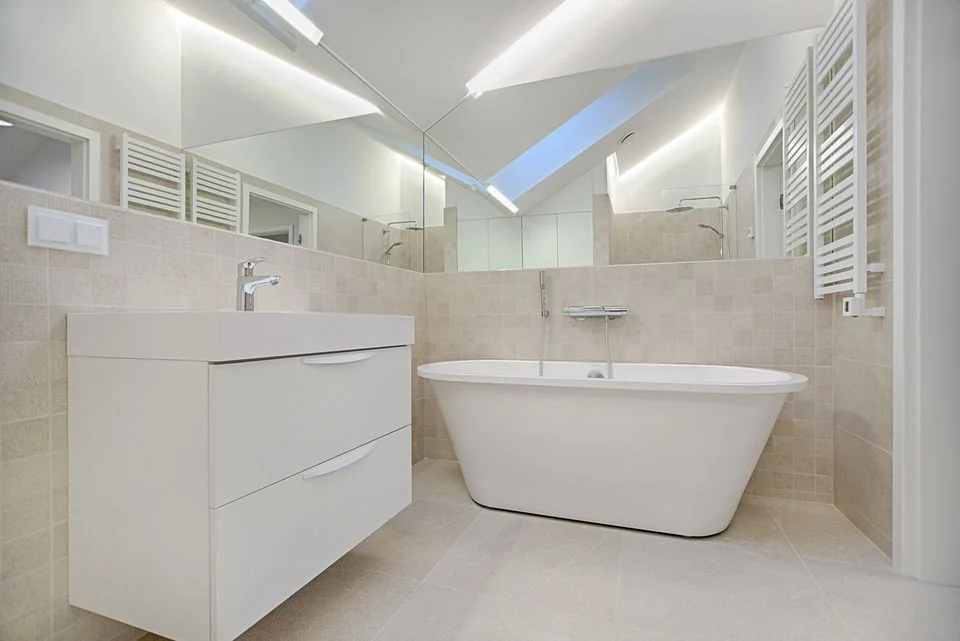 Light-filled bathroom with a freestanding bath, shower and vanity